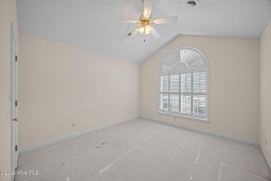 Enjoy easy living in this 2-bedroom, 2-bath patio home located on Cypress Landing Golf Club in North Carolina - for sale on GolfHomes.com, golf home, golf lot