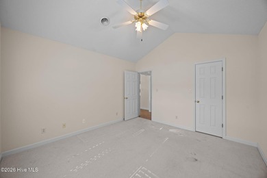 Enjoy easy living in this 2-bedroom, 2-bath patio home located on Cypress Landing Golf Club in North Carolina - for sale on GolfHomes.com, golf home, golf lot