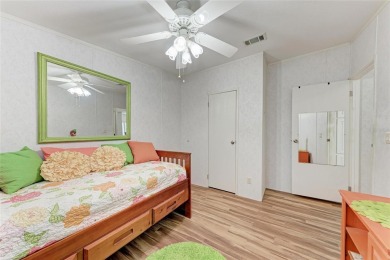Welcome to this 3-bedroom, 2-bath fully furnished turnkey mobile on Kings Gate Golf Club in Florida - for sale on GolfHomes.com, golf home, golf lot