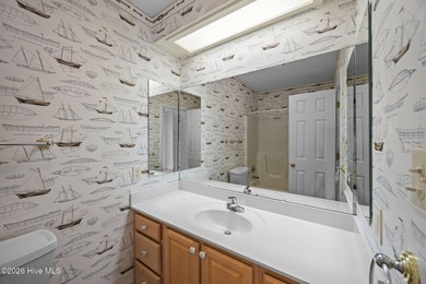 Enjoy easy living in this 2-bedroom, 2-bath patio home located on Cypress Landing Golf Club in North Carolina - for sale on GolfHomes.com, golf home, golf lot