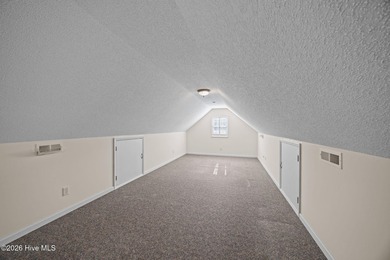 Enjoy easy living in this 2-bedroom, 2-bath patio home located on Cypress Landing Golf Club in North Carolina - for sale on GolfHomes.com, golf home, golf lot