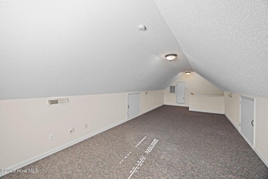 Enjoy easy living in this 2-bedroom, 2-bath patio home located on Cypress Landing Golf Club in North Carolina - for sale on GolfHomes.com, golf home, golf lot