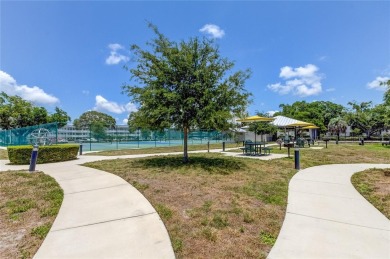 Welcome to carefree living in this spacious ground-floor condo on On Top Of The World Golf Course in Florida - for sale on GolfHomes.com, golf home, golf lot
