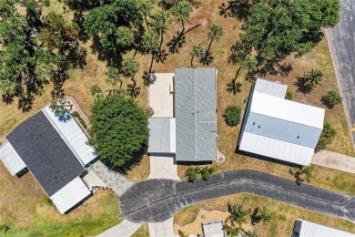 Welcome to this 3-bedroom, 2-bath fully furnished turnkey mobile on Kings Gate Golf Club in Florida - for sale on GolfHomes.com, golf home, golf lot