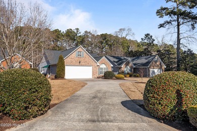 Enjoy easy living in this 2-bedroom, 2-bath patio home located on Cypress Landing Golf Club in North Carolina - for sale on GolfHomes.com, golf home, golf lot