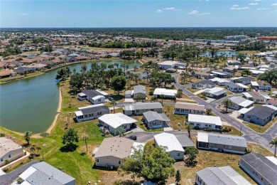 Welcome to this 3-bedroom, 2-bath fully furnished turnkey mobile on Kings Gate Golf Club in Florida - for sale on GolfHomes.com, golf home, golf lot