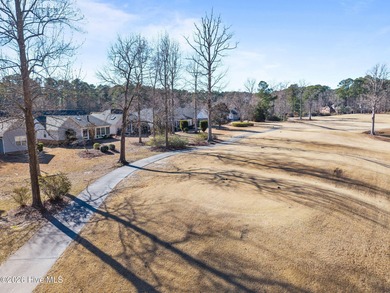 Enjoy easy living in this 2-bedroom, 2-bath patio home located on Cypress Landing Golf Club in North Carolina - for sale on GolfHomes.com, golf home, golf lot