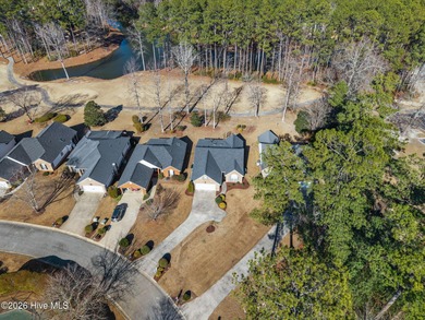 Enjoy easy living in this 2-bedroom, 2-bath patio home located on Cypress Landing Golf Club in North Carolina - for sale on GolfHomes.com, golf home, golf lot