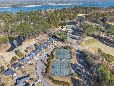 Enjoy easy living in this 2-bedroom, 2-bath patio home located on Cypress Landing Golf Club in North Carolina - for sale on GolfHomes.com, golf home, golf lot