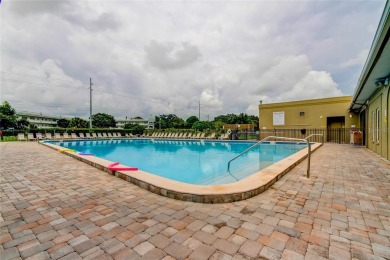 Welcome to carefree living in this spacious ground-floor condo on On Top Of The World Golf Course in Florida - for sale on GolfHomes.com, golf home, golf lot