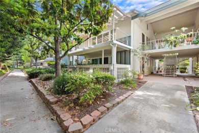 This is a light and bright upstairs coop in the heart of Laguna on Laguna Woods Village Golf Course in California - for sale on GolfHomes.com, golf home, golf lot