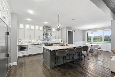 Experience refined living in this exceptional Millwood at on Millwood Golf and Racquet Club in Missouri - for sale on GolfHomes.com, golf home, golf lot