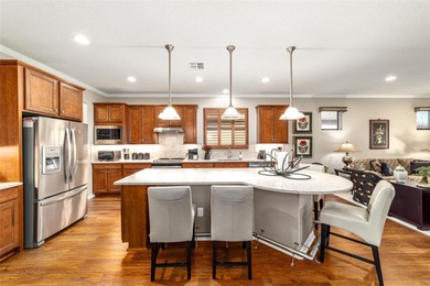 Enjoy effortless living in this beautiful two-bedroom, two-bath on Stone Creek Golf Club in Florida - for sale on GolfHomes.com, golf home, golf lot