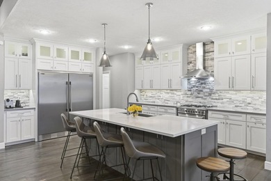 Experience refined living in this exceptional Millwood at on Millwood Golf and Racquet Club in Missouri - for sale on GolfHomes.com, golf home, golf lot