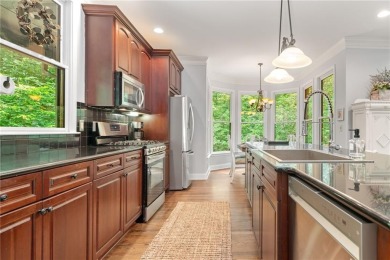 Nestled in a serene natural setting, this breathtaking 3-story on Big Canoe Golf Club - Cherokee in Georgia - for sale on GolfHomes.com, golf home, golf lot