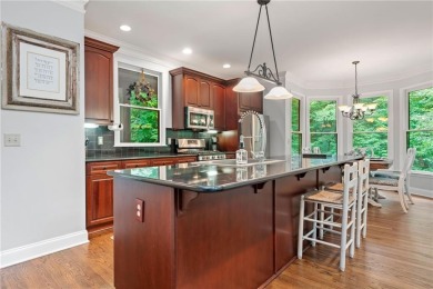 Nestled in a serene natural setting, this breathtaking 3-story on Big Canoe Golf Club - Cherokee in Georgia - for sale on GolfHomes.com, golf home, golf lot