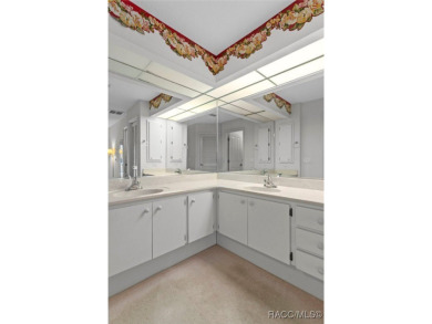 Discover this inviting 3-bedroom, 2-bath pool home nestled in on Sugarmill Woods Golf and Country Club in Florida - for sale on GolfHomes.com, golf home, golf lot