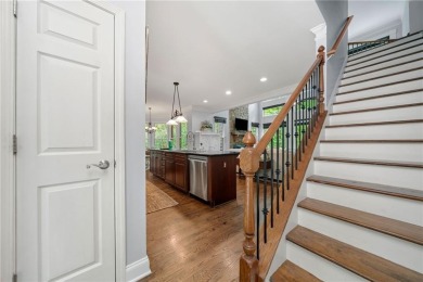 Nestled in a serene natural setting, this breathtaking 3-story on Big Canoe Golf Club - Cherokee in Georgia - for sale on GolfHomes.com, golf home, golf lot