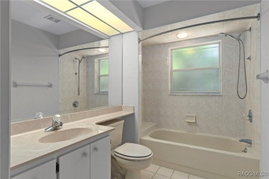 Discover this inviting 3-bedroom, 2-bath pool home nestled in on Sugarmill Woods Golf and Country Club in Florida - for sale on GolfHomes.com, golf home, golf lot