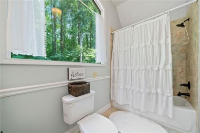 Nestled in a serene natural setting, this breathtaking 3-story on Big Canoe Golf Club - Cherokee in Georgia - for sale on GolfHomes.com, golf home, golf lot