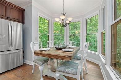 Nestled in a serene natural setting, this breathtaking 3-story on Big Canoe Golf Club - Cherokee in Georgia - for sale on GolfHomes.com, golf home, golf lot