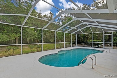 Discover this inviting 3-bedroom, 2-bath pool home nestled in on Sugarmill Woods Golf and Country Club in Florida - for sale on GolfHomes.com, golf home, golf lot