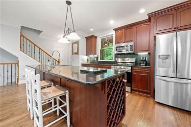 Nestled in a serene natural setting, this breathtaking 3-story on Big Canoe Golf Club - Cherokee in Georgia - for sale on GolfHomes.com, golf home, golf lot