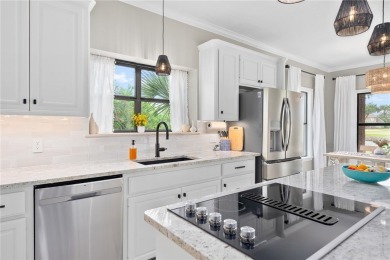 Elegant all-brick that overlooks a pond, Rockport golf course on Rockport Country Club in Texas - for sale on GolfHomes.com, golf home, golf lot