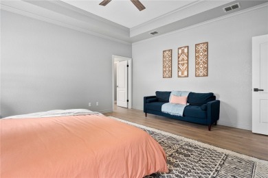 Elegant all-brick that overlooks a pond, Rockport golf course on Rockport Country Club in Texas - for sale on GolfHomes.com, golf home, golf lot