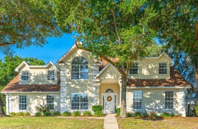 Perfectly positioned on a high corner lot, this 2,663 square on Shalimar Pointe Golf and Country Club in Florida - for sale on GolfHomes.com, golf home, golf lot
