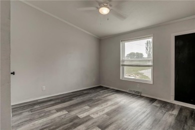 Come fall in love with this beautifully maintained five-lot on Linn Valley Lakes - Deer Trace Golf Course in Kansas - for sale on GolfHomes.com, golf home, golf lot