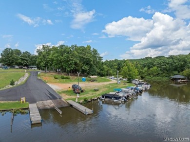 The beautiful custom built home is located in a Lake Gaston on River Ridge Golf Club in Virginia - for sale on GolfHomes.com, golf home, golf lot