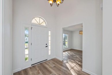 Perfectly positioned on a high corner lot, this 2,663 square on Shalimar Pointe Golf and Country Club in Florida - for sale on GolfHomes.com, golf home, golf lot