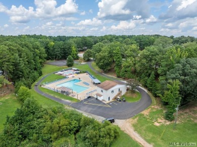 The beautiful custom built home is located in a Lake Gaston on River Ridge Golf Club in Virginia - for sale on GolfHomes.com, golf home, golf lot