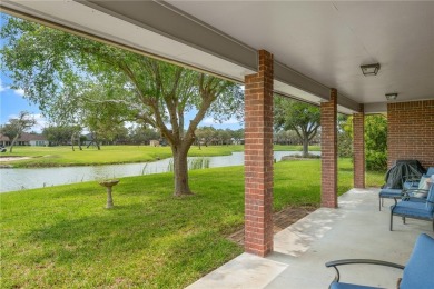 Elegant all-brick that overlooks a pond, Rockport golf course on Rockport Country Club in Texas - for sale on GolfHomes.com, golf home, golf lot
