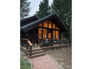 Escape to your dream cabin in beautiful McCall! This charming on McCall Municipal Golf Course in Idaho - for sale on GolfHomes.com, golf home, golf lot