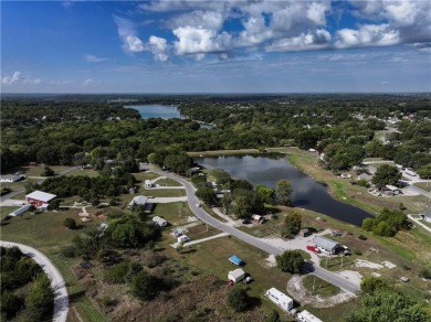 Come fall in love with this beautifully maintained five-lot on Linn Valley Lakes - Deer Trace Golf Course in Kansas - for sale on GolfHomes.com, golf home, golf lot