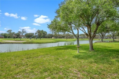Elegant all-brick that overlooks a pond, Rockport golf course on Rockport Country Club in Texas - for sale on GolfHomes.com, golf home, golf lot