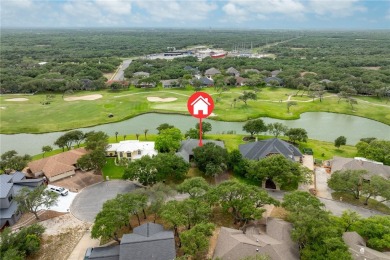 Elegant all-brick that overlooks a pond, Rockport golf course on Rockport Country Club in Texas - for sale on GolfHomes.com, golf home, golf lot