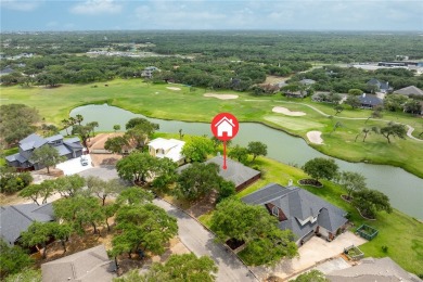 Elegant all-brick that overlooks a pond, Rockport golf course on Rockport Country Club in Texas - for sale on GolfHomes.com, golf home, golf lot