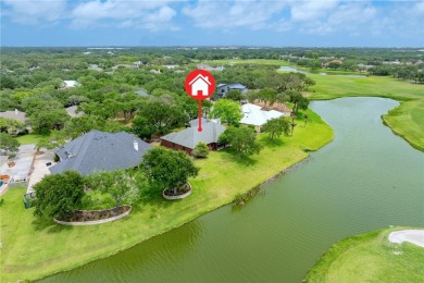 Elegant all-brick that overlooks a pond, Rockport golf course on Rockport Country Club in Texas - for sale on GolfHomes.com, golf home, golf lot