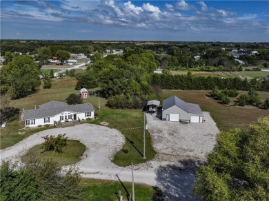 Come fall in love with this beautifully maintained five-lot on Linn Valley Lakes - Deer Trace Golf Course in Kansas - for sale on GolfHomes.com, golf home, golf lot