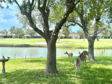 Elegant all-brick that overlooks a pond, Rockport golf course on Rockport Country Club in Texas - for sale on GolfHomes.com, golf home, golf lot