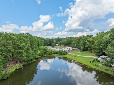 The beautiful custom built home is located in a Lake Gaston on River Ridge Golf Club in Virginia - for sale on GolfHomes.com, golf home, golf lot