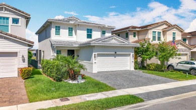 Welcome to this beautiful designed 3-bedroom + den, 2.5-bathroom on Crystal Lake Country Club in Florida - for sale on GolfHomes.com, golf home, golf lot
