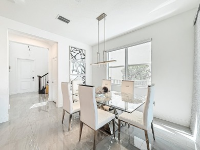 Welcome to this beautiful designed 3-bedroom + den, 2.5-bathroom on Crystal Lake Country Club in Florida - for sale on GolfHomes.com, golf home, golf lot