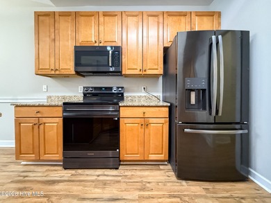 Charming 2-bedroom, 2-bath townhome in the highly desirable on Magnolia Greens Golf Plantation in North Carolina - for sale on GolfHomes.com, golf home, golf lot