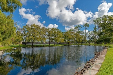 Welcome to 5086 Palena Drive in the gated 55+ community of on Sabal Trace Golf and Country Club in Florida - for sale on GolfHomes.com, golf home, golf lot