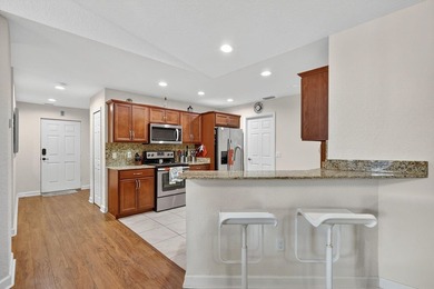 Enjoy gorgeous lake views from this gently lived-in home in a on Spanish Lakes Fairways in Florida - for sale on GolfHomes.com, golf home, golf lot