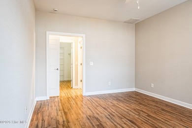 Charming 2-bedroom, 2-bath townhome in the highly desirable on Magnolia Greens Golf Plantation in North Carolina - for sale on GolfHomes.com, golf home, golf lot